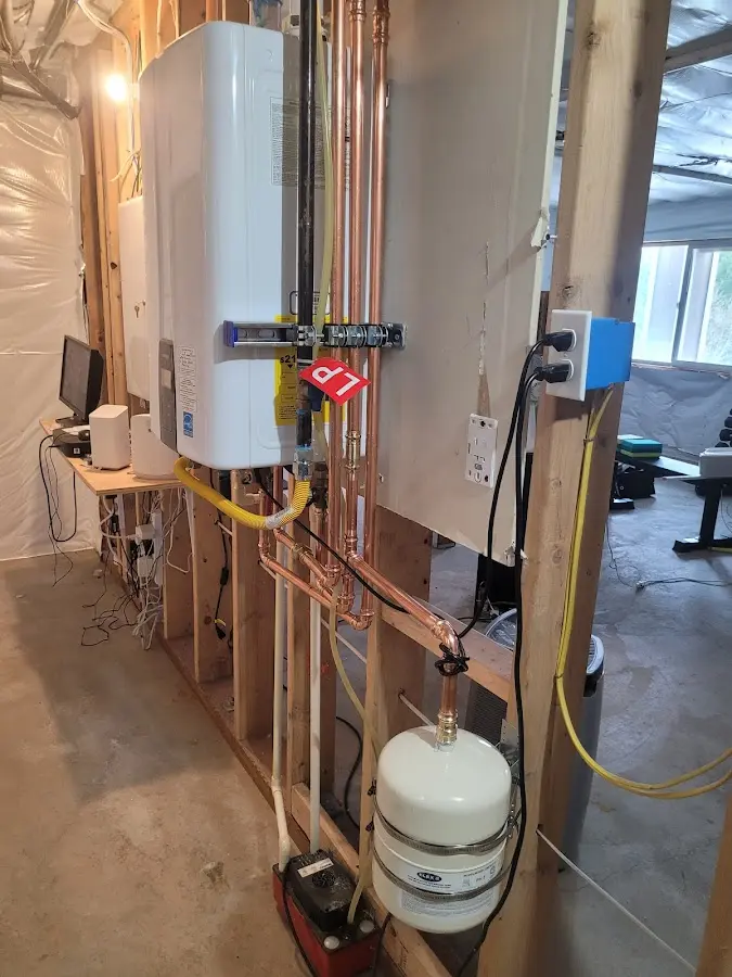 Licensed plumber repairing a kitchen sink in Medway