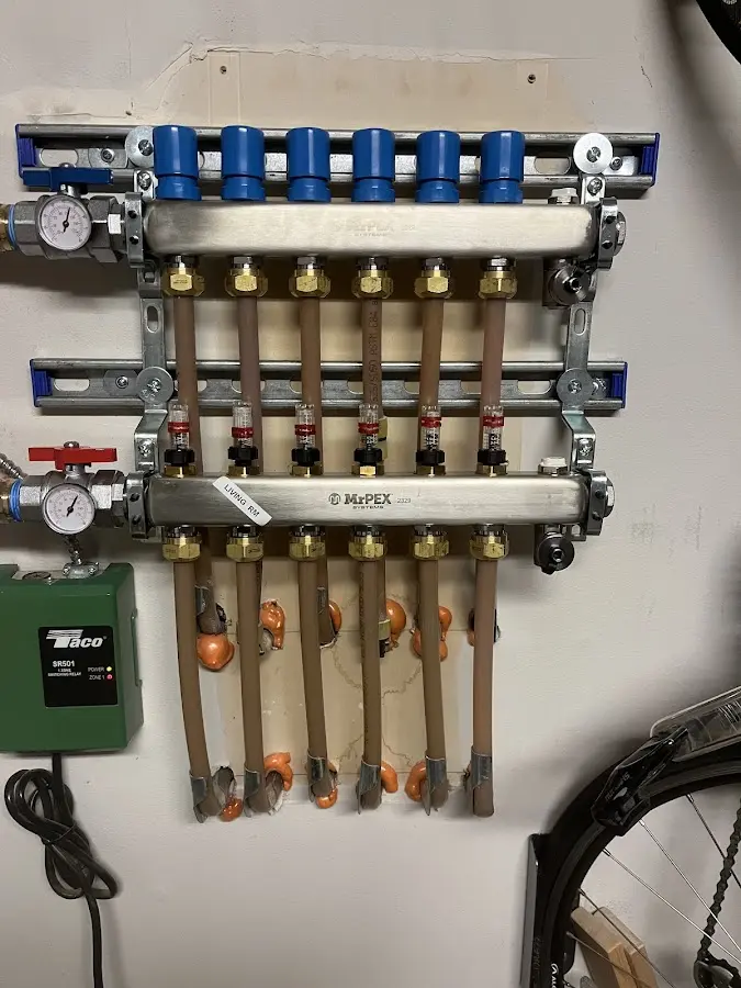 Plumber performing Water Heater Repair at a residential property in Medway