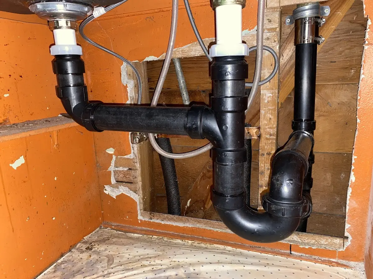 Professional Garbage Disposal Repair equipment and tools on the job in Medway